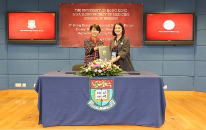 Professor Chia-Chin Lin and Professor Dong-Hee Kim of the Pusan National University.